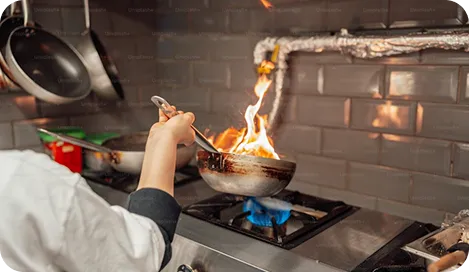 Person cooking in kitchen
